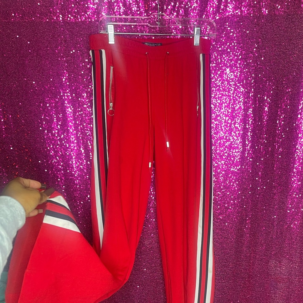 Women’s red spandex/flare material pants